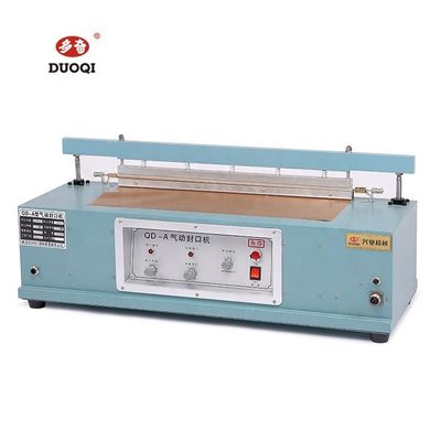 DUOQI QD-A600 Macchina di sigillamento pneumatico per tavoli in alluminio per le necessità di imballaggio di merci