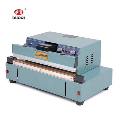 Tipo di imballaggio Cartoni DUOQI FKR-450 Macchina semiautomatica di sigillamento per tavoli industriali